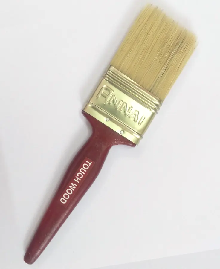 Annai Touch Wood two inch brush with a deep red handle and brass ferrule